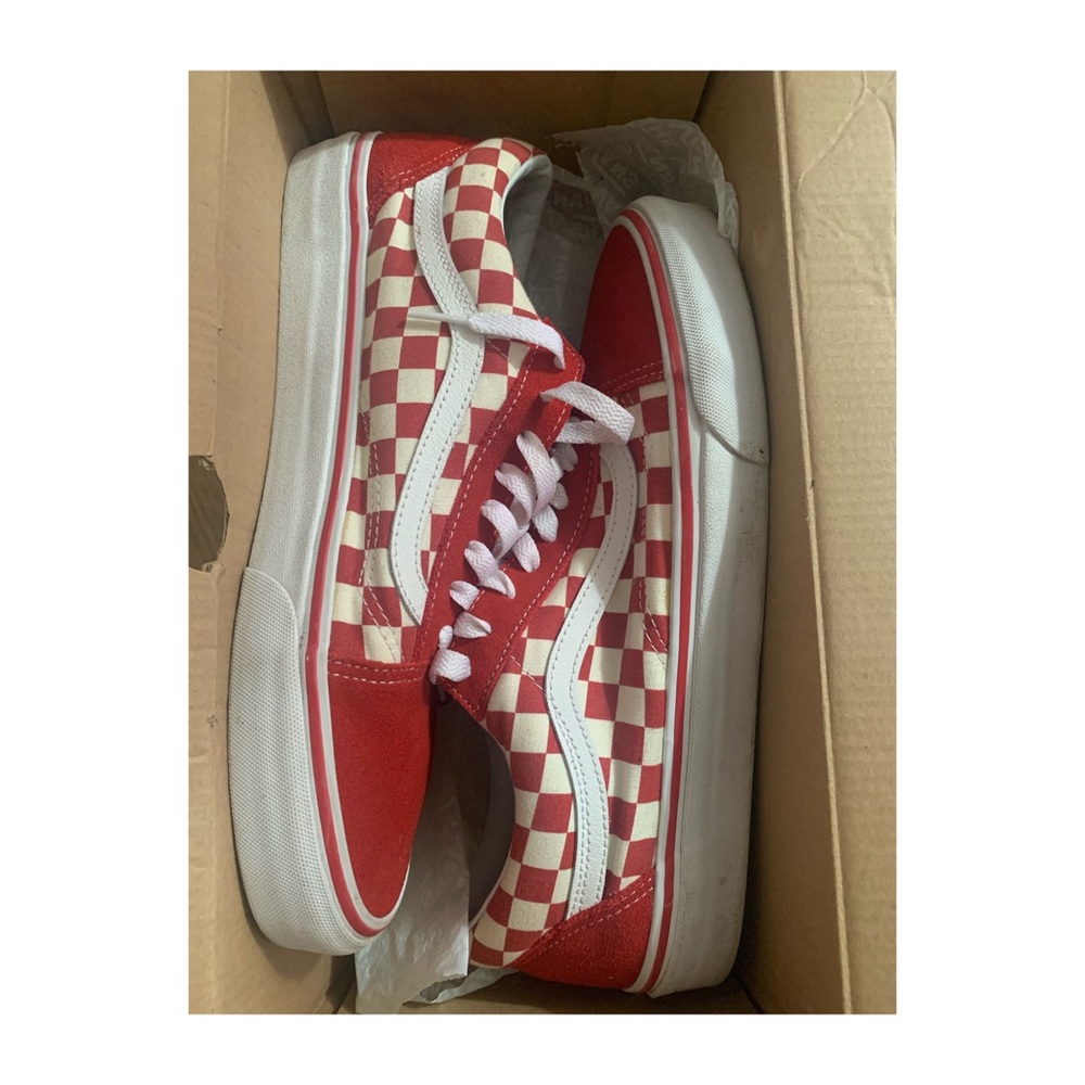 Old School checkered red and white Vans sneakers